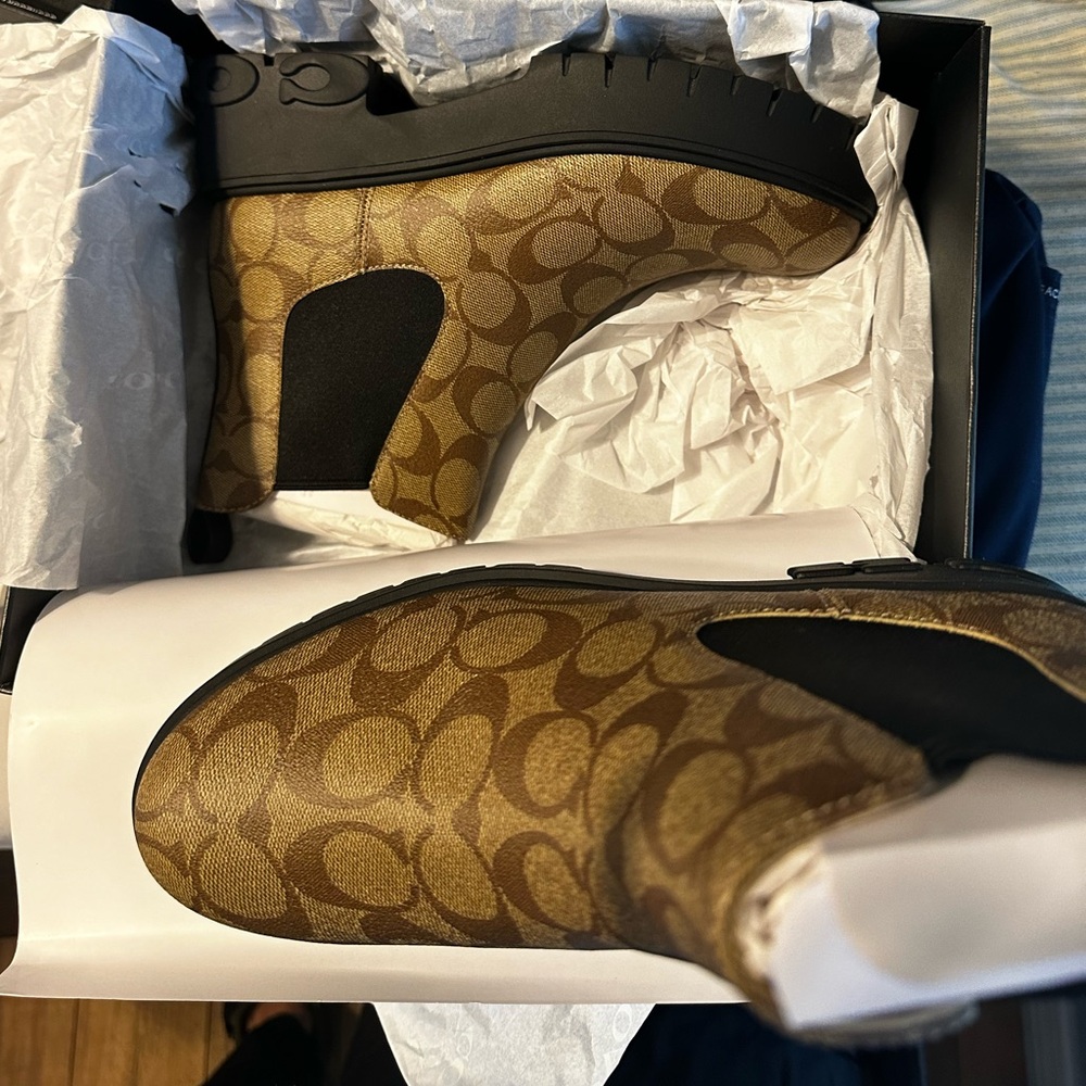 Brand new Coach booties or boots. Never been worn.